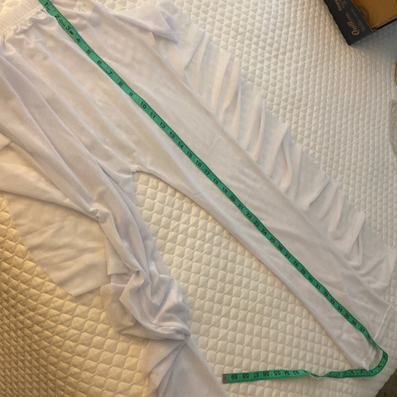 Sheer white long pants with side ruffles. Size Med, 65% polyester 35 % cotton - Picture 4 of 5